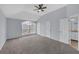 Spacious bedroom with vaulted ceiling, large window and a ceiling fan at 560 Woodstone Rd, Lithonia, GA 30058