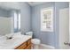 Bright bathroom featuring a modern sink and a window at 79 Greystone Way, Hiram, GA 30141