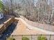 Walking path situated behind the home with wooded views at 79 Greystone Way, Hiram, GA 30141