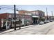Charming street view featuring local shops and restaurants in a bustling neighborhood at 204 College Cir # 1003, Hapeville, GA 30354