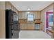 Neutral kitchen features stainless steel dishwasher and wood countertops at 362 Hardy Cir, Dallas, GA 30157