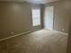 Bedroom with neutral walls, carpet and natural light at 3999 Riverside Pkwy, Decatur, GA 30034