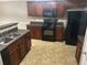 Functional kitchen with appliances, ample counter space, and dark wood cabinetry at 3999 Riverside Pkwy, Decatur, GA 30034