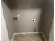 Laundry room with tile floor and hookups at 3999 Riverside Pkwy, Decatur, GA 30034
