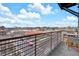 Relaxing balcony with chairs and table overlooking the city at 360 Chambers St # 301, Woodstock, GA 30188