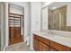 Bathroom features a closet room, a separate shower, and a vanity with a sink at 360 Chambers St # 301, Woodstock, GA 30188