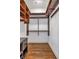 Walk-in closet with custom shelves and drawers at 360 Chambers St # 301, Woodstock, GA 30188