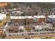 Aerial view of a multi-story building with retail space on the ground floor, a green space and parking at 360 Chambers St # 301, Woodstock, GA 30188