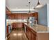 Kitchen with stainless steel appliances, hardwood floors, granite countertops and an island at 360 Chambers St # 301, Woodstock, GA 30188
