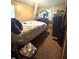 Bedroom with bed, dark dresser and carpet at 1091 Summer Lake Rd, Lithia Springs, GA 30122