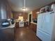Well-lit kitchen with wood cabinets, and modern appliances offering ample counter space at 1091 Summer Lake Rd, Lithia Springs, GA 30122