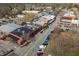 Overhead view of the town's commercial district showing buildings, parking, and traffic flow at 16 Ramsey St, Roswell, GA 30075
