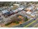 Panoramic aerial view of the town square featuring surrounding buildings, streets, and landscape at 16 Ramsey St, Roswell, GA 30075