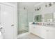 Bright bathroom featuring a glass shower, double vanity and grey and white color scheme at 16 Ramsey St, Roswell, GA 30075