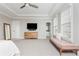 Comfortable bedroom featuring tray ceiling, neutral colors, and lots of natural light at 16 Ramsey St, Roswell, GA 30075