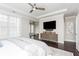Spacious main bedroom features ceiling fan and flows into workout area at 16 Ramsey St, Roswell, GA 30075