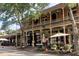 Attractive street view of businesses with outdoor seating areas, creating a vibrant atmosphere at 16 Ramsey St, Roswell, GA 30075