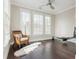 Bright workout area with hardwood floors, lots of windows, and ceiling fan at 16 Ramsey St, Roswell, GA 30075