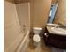 Bathroom with a tiled floor, vanity with granite counter, and shower at 4667 Derby Loop, Fairburn, GA 30213