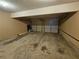 Spacious two car garage with concrete floors and garage doors at 4667 Derby Loop, Fairburn, GA 30213