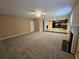 The living room opens into the kitchen for easy flow when entertaining guests at 4667 Derby Loop, Fairburn, GA 30213