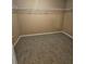 Walk-in closet boasts ample storage space with metal shelving at 4667 Derby Loop, Fairburn, GA 30213