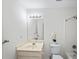 Bathroom featuring a vanity, toilet, tub, and shower at 10440 Cranchester Way, Alpharetta, GA 30022