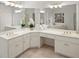 Vanity with double sinks, ample counter space, and soft lighting at 10440 Cranchester Way, Alpharetta, GA 30022