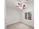 Bedroom featuring a ceiling fan and bright window at 10440 Cranchester Way, Alpharetta, GA 30022