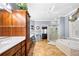 Primary bathroom featuring double vanity, tub, separate shower, and walk-in closet at 3428 Stembler Rdg, Douglasville, GA 30135