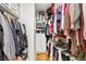 Spacious walk-in closet featuring custom shelving, racks, and ample storage space for clothes and accessories at 3428 Stembler Rdg, Douglasville, GA 30135