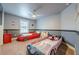 This bedroom features unique car shaped beds and light grey walls at 1050 Silver Thorne Dr, Loganville, GA 30052