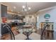Kitchen dining area with glass table and chairs, offering access to kitchen appliances at 1050 Silver Thorne Dr, Loganville, GA 30052