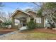 Craftsman home with charming porch and overhead fan, set amidst trees and stone pathway at 816 3Rd Ave, Decatur, GA 30030