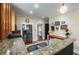 Granite countertops and double sinks highlight this kitchen, with hardwood floors and a refrigerator at 816 3Rd Ave, Decatur, GA 30030