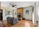 Inviting living room featuring a stone fireplace, hardwood floors, and a neutral color palette at 816 3Rd Ave, Decatur, GA 30030