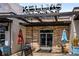 Kelly's Market with a stone facade, outdoor seating and signage at 816 3Rd Ave, Decatur, GA 30030