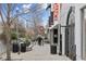 An active street with commercial buildings, pedestrian traffic and trees at 816 3Rd Ave, Decatur, GA 30030