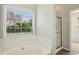 Bathroom features a large tub and shower unit at 3641 Willow Club Dr, Loganville, GA 30052