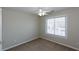 Bedroom featuring neutral walls, carpeted floors, and a window at 3641 Willow Club Dr, Loganville, GA 30052