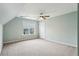 Light-filled bedroom features a ceiling fan, plush carpeting, and a window with blinds at 3641 Willow Club Dr, Loganville, GA 30052