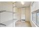 Walk-in closet with adjustable wire shelving and a window providing natural light at 3641 Willow Club Dr, Loganville, GA 30052