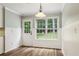 Bright eat-in kitchen featuring natural lighting and views of the backyard at 3641 Willow Club Dr, Loganville, GA 30052
