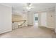 Upstairs landing features new carpet, white trim, and lots of natural light at 3641 Willow Club Dr, Loganville, GA 30052