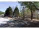Community playground and bike racks near parking lot and trees, offering outdoor activities for residents at 3641 Willow Club Dr, Loganville, GA 30052