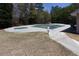 Community pool is covered and fenced-in during the off-season at 3641 Willow Club Dr, Loganville, GA 30052