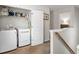 Convenient upstairs laundry room with new washer and dryer at 5152 Rapahoe Trl, Atlanta, GA 30349