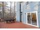 Spacious deck with string lights and seating offers a peaceful outdoor living area at 1744 Millview Dr, Marietta, GA 30062