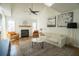 Bright living room offers a fireplace and vaulted ceiling for a spacious feel at 1744 Millview Dr, Marietta, GA 30062