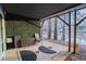 Covered outdoor patio overlooking the lake is a perfect place to entertain or relax at 1744 Millview Dr, Marietta, GA 30062